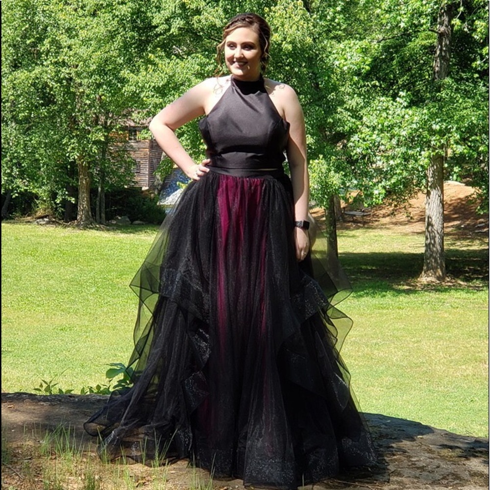 Two piece black and fuchsia colored prom dress